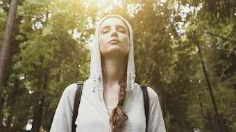 woman practicing mindfulness in nature