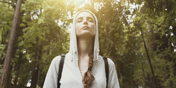 woman practicing mindfulness in nature