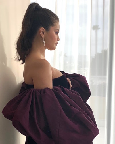 Marissa Marino styled Selena Gomez's hairstyle using René Furterer products.