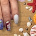 Go under the sea with this mermaid nail art tutorial from Nguyen Nhung!