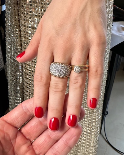 Tom Bachik created Michelle William's red manicure for the Critics' Choice Awards