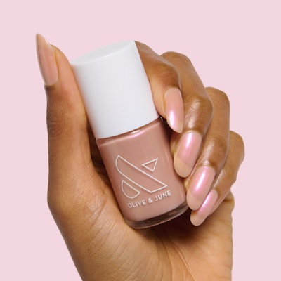Sandy Scallop is a golden iridescent nail color a part of Olive & June's new seashell collection.