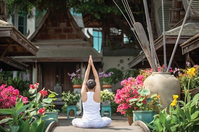 Guests at The Peninsula Bangkok can balance their chakras at sunrise yoga or at a Buddhist sunrise ritual.