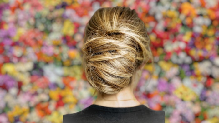 Hairstylist Lindsey Olson shares how to create a modern French twist perfect for bridal season.