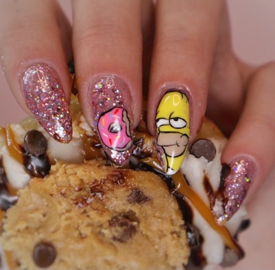 Homer Simpson donut nail art by @keepinittreal.
