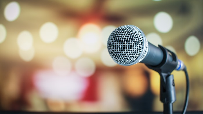 speaker at business event imagery