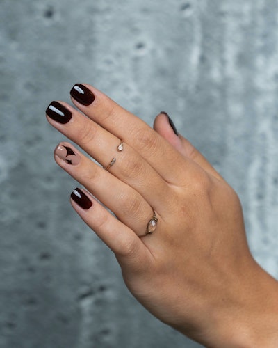 A latte brown manicure with sparkles