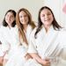 Teenage Girl Taking Selfie With Mother And Sister At Spa