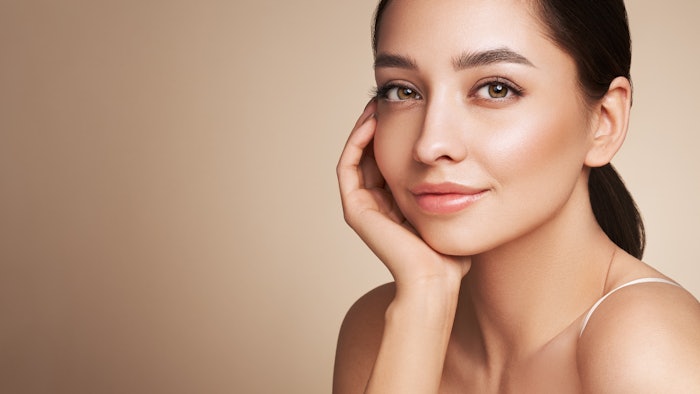 Portrait beautiful young woman with clean fresh skin. Model with healthy skin, close up portrait. Cosmetology, beauty and spa