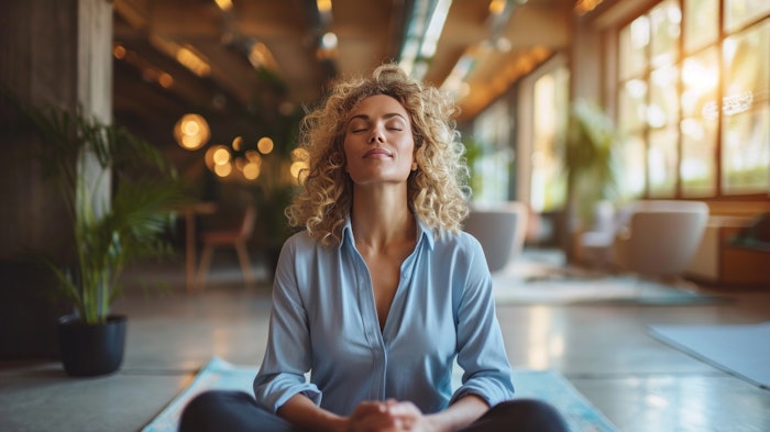 Executive engaged in a wellness routine, balancing work and health with grace