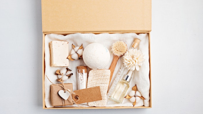 Preparing self care package, seasonal gift box with plastic free zero waste cosmetics products