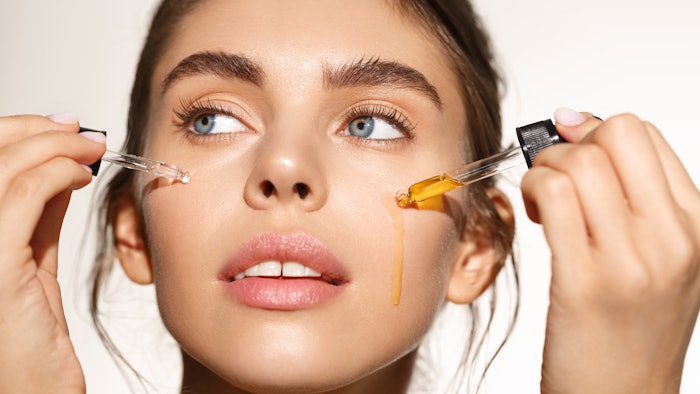 Woman Applying Serum