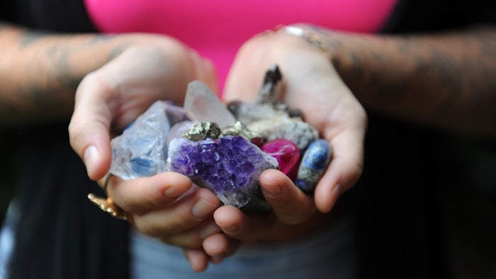 Woman's hands holding crystals