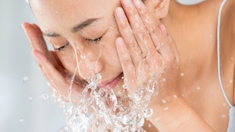 Woman washing face