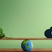 Carbon Neutral and ESG Concepts. Carbon Emission, Clean Energy. Globe Balancing between a Green leaf and CO2. Sustainable Resources, Big deal for Company and Indstry to Concern about Environmental