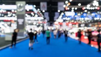 People buzzing on a tradeshow floor