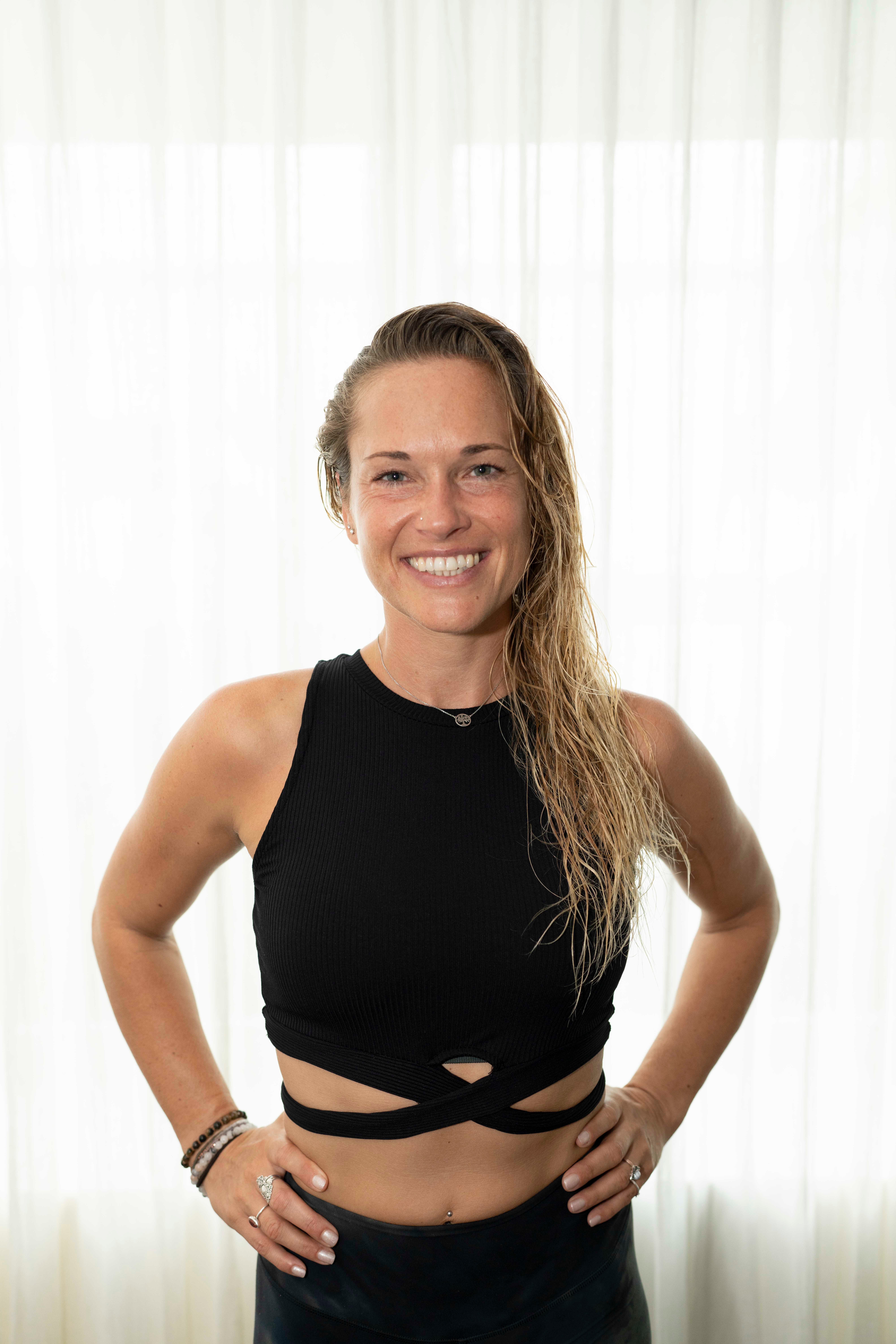 Nadine Tonnis in workout outfit posing for camera