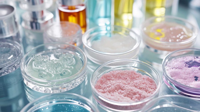 colorful cosmetic samples in glassware in chemistry lab poured in petri dishes AdobeStock_713341291