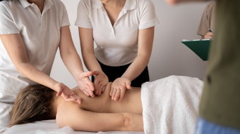 Spa technicians participating in a class