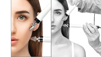 Woman with energy devices by her face in the spa