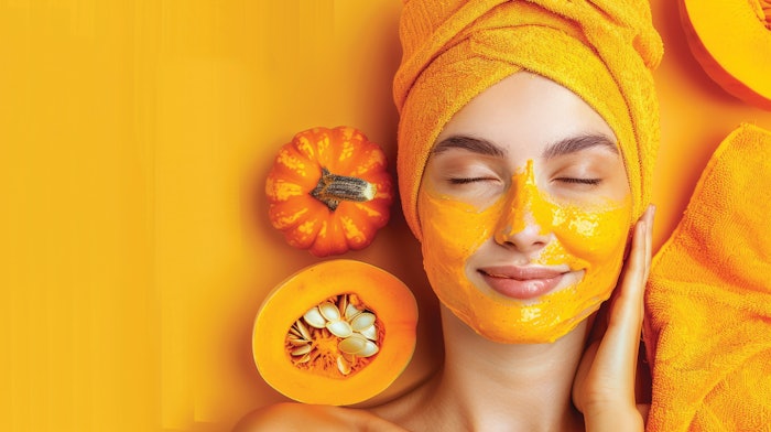 woman getting a pumpkin facial at the spa