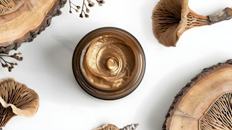 Reishi mushroom next to a skin care cream