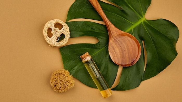 Stephenson Durasoft stock art oil in vial background leaf natural cosmetic concept