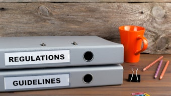 Regulations books on a desk