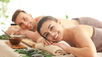 Young couple relaxing in spa salon