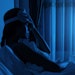 Young woman with a headache and insomnia
