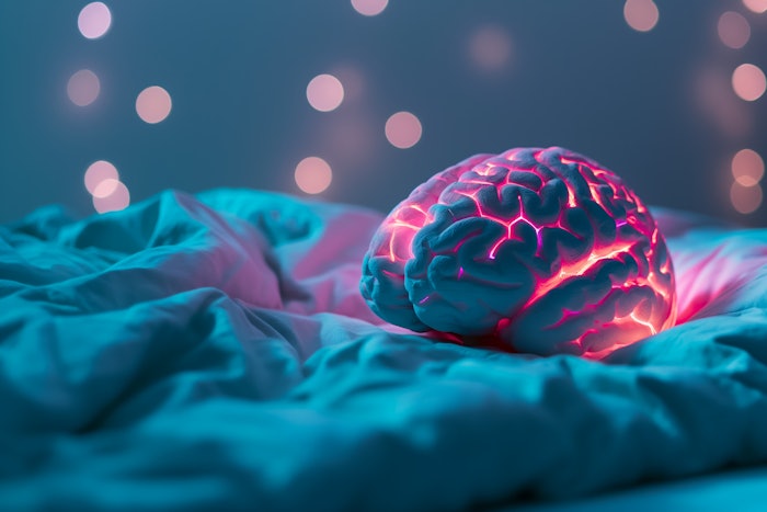 Glowing brain model highlighting REM sleep activity, background with empty space for text