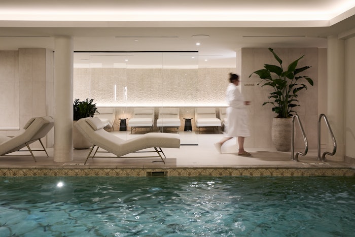 Woman walking in Kohler Waters Spa