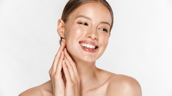 Women with a clean makeup look smiling