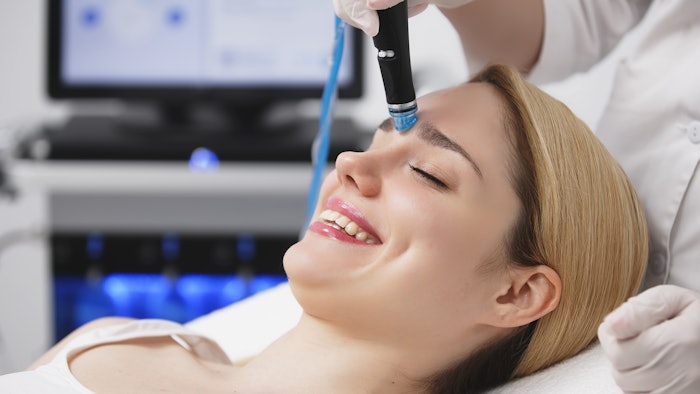 Woman gets hydradermabrasion in the spa