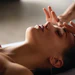 woman getting stress releasing facial massage