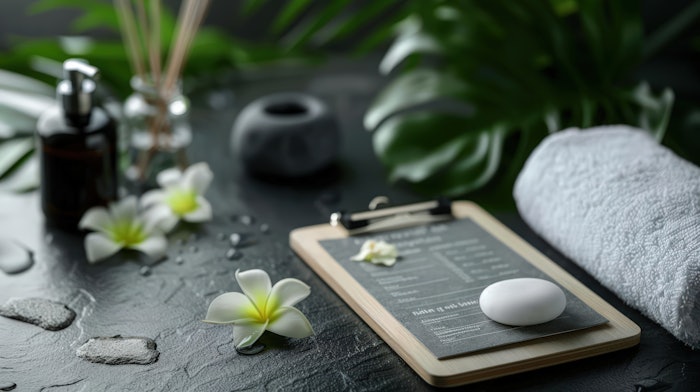 Minimal spa menu on clipboard, single treatment listed