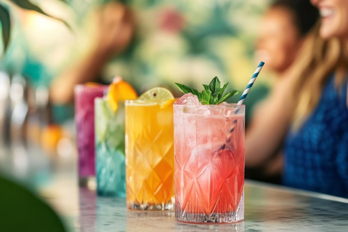 Trendy bar, non-alcoholic mocktails, colorful, refreshing, alcohol-free, health-conscious, happy patrons, sober, spirit-free, clear-headed, responsible socializing