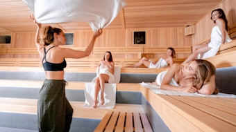 Sauna master making ritual in Finnish sauna