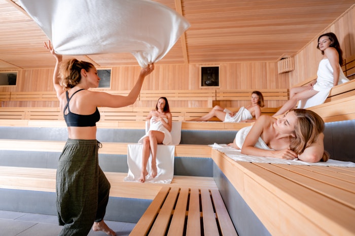 Sauna master making ritual in Finnish sauna