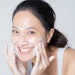 Beautiful Asian Woman Washing Face Smiling Foam Cleanser Adobe Stock 370774077