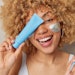 Beautiful Curly Haired Woman Under Eye Patches Oral Care And Tube Adobe Stock 503376344