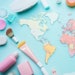Lipstick Products Makeup Sprawled On Map Adobe Stock 997753164