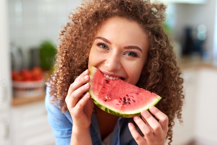 Woman Cute Curly Hair Eating Watermelon Nutricosmetic Concept Adobe Stock 288870058