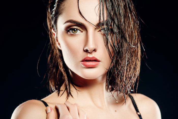 Beautiful Brunette With Damp Hair Adobe Stock 102758066