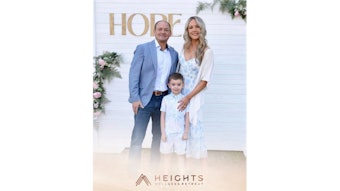 Brian and Desi Godwin with their son.