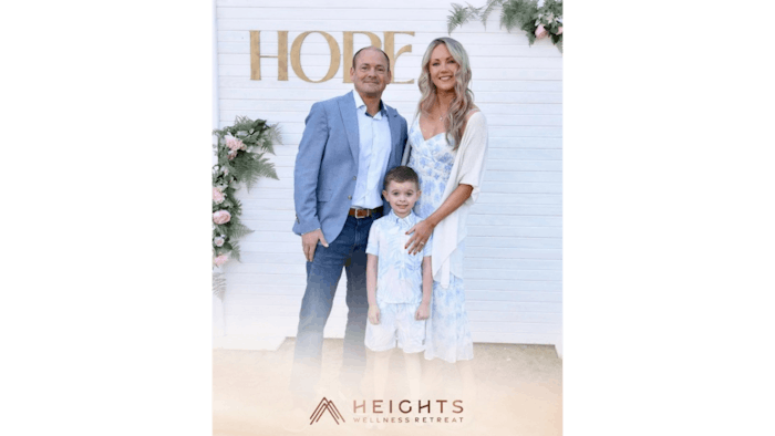 Brian and Desi Godwin with their son.