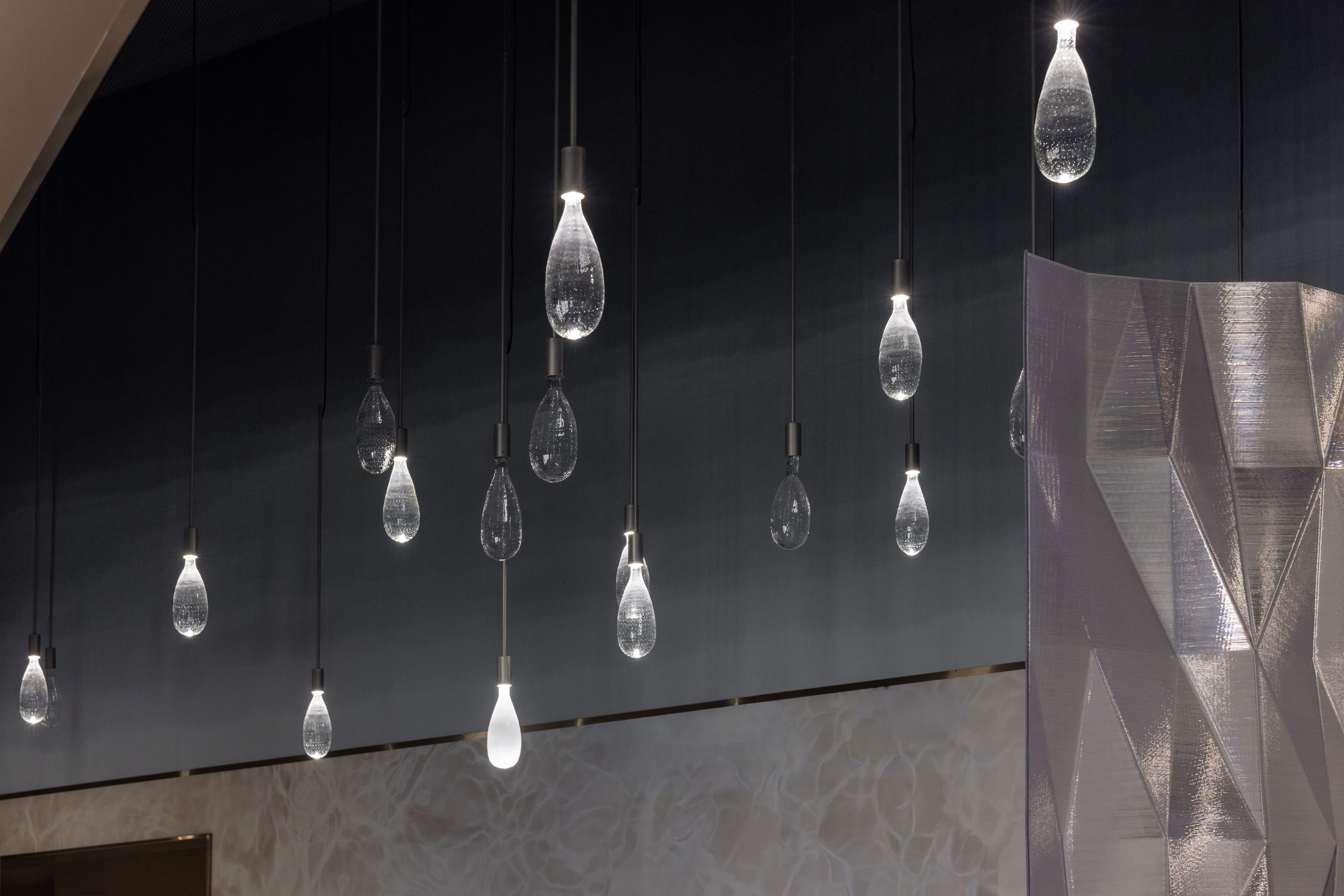 The design of Halcyon Spa was inspired by the movement of light and water, creating a dynamic environment with airier regions, as well as moodier ones.