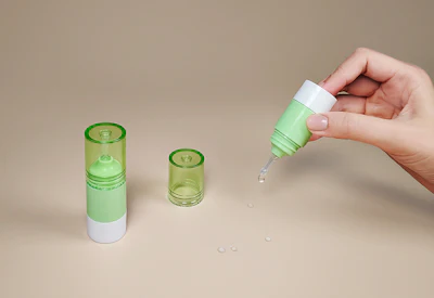 Portable packaging included an Airless Push Button Dropper in 10 ml and 15 ml sizes, designed for one-handed dispensing across multiple formulation types.