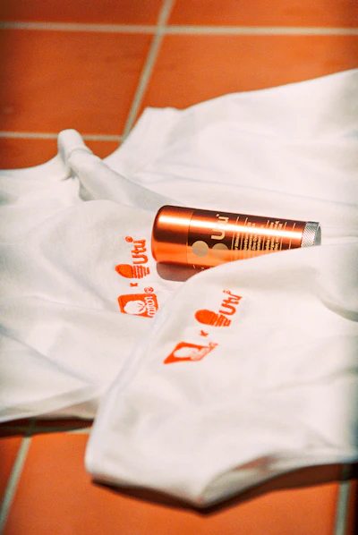 Cotton Incorporated and outdoor skin care brand Utu are taking an unusual approach to sun care with The Essential Layer, a wellness collaboration that pairs 100% cotton apparel with Utu’s SPF50 Lightly Tinted Sunscreen Stick.