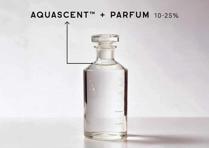 Clear glass perfume bottle labeled Aquascent with Parfum 10-25% concentration on white background